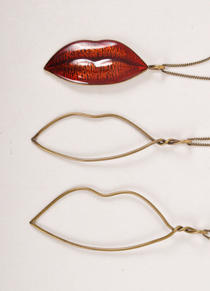 Lot of Three Gold and Red Lip Necklaces