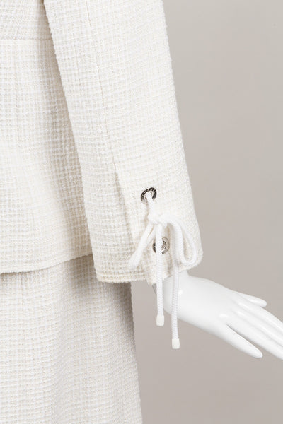 White Tie and Grommet Detail Silk, Cotton, and Linen Tweed Skirt Suit